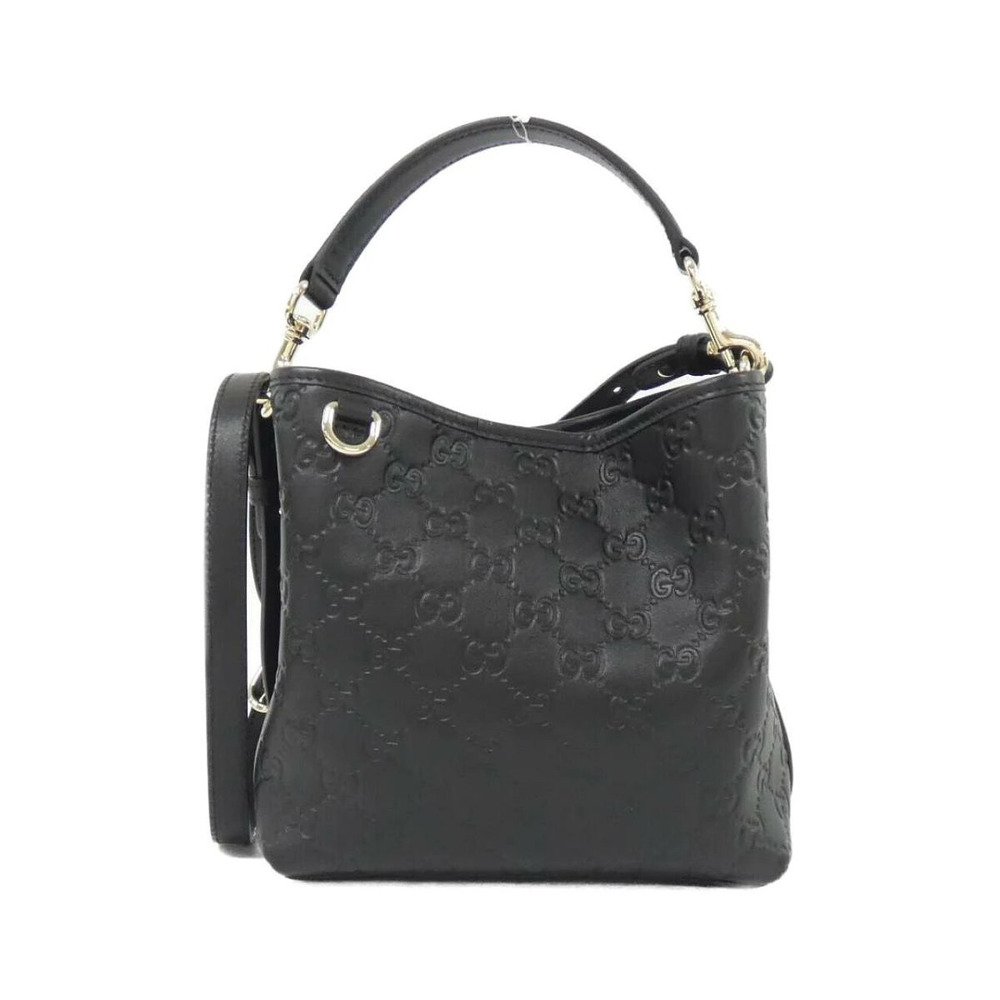 Gucci GG Emblem bucket bag debossed leather Black